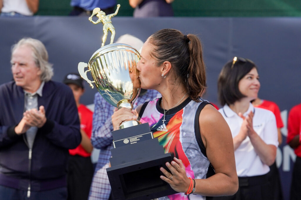 Daria Kasatkina kisses the National Bank Open trophy.
